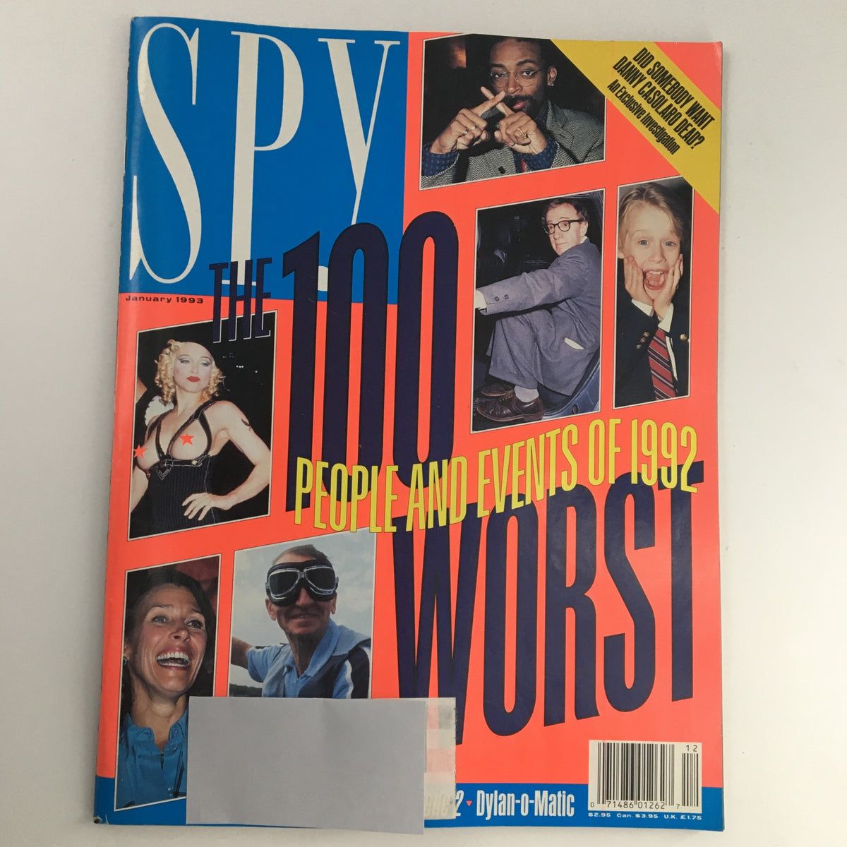 Cover of Spy Magazine January 1993 featuring Madonna and the title 'The 100 Worst People and Events of 1992'. A vibrant, colorful design showcases celebrity faces and humorous critique of the year.