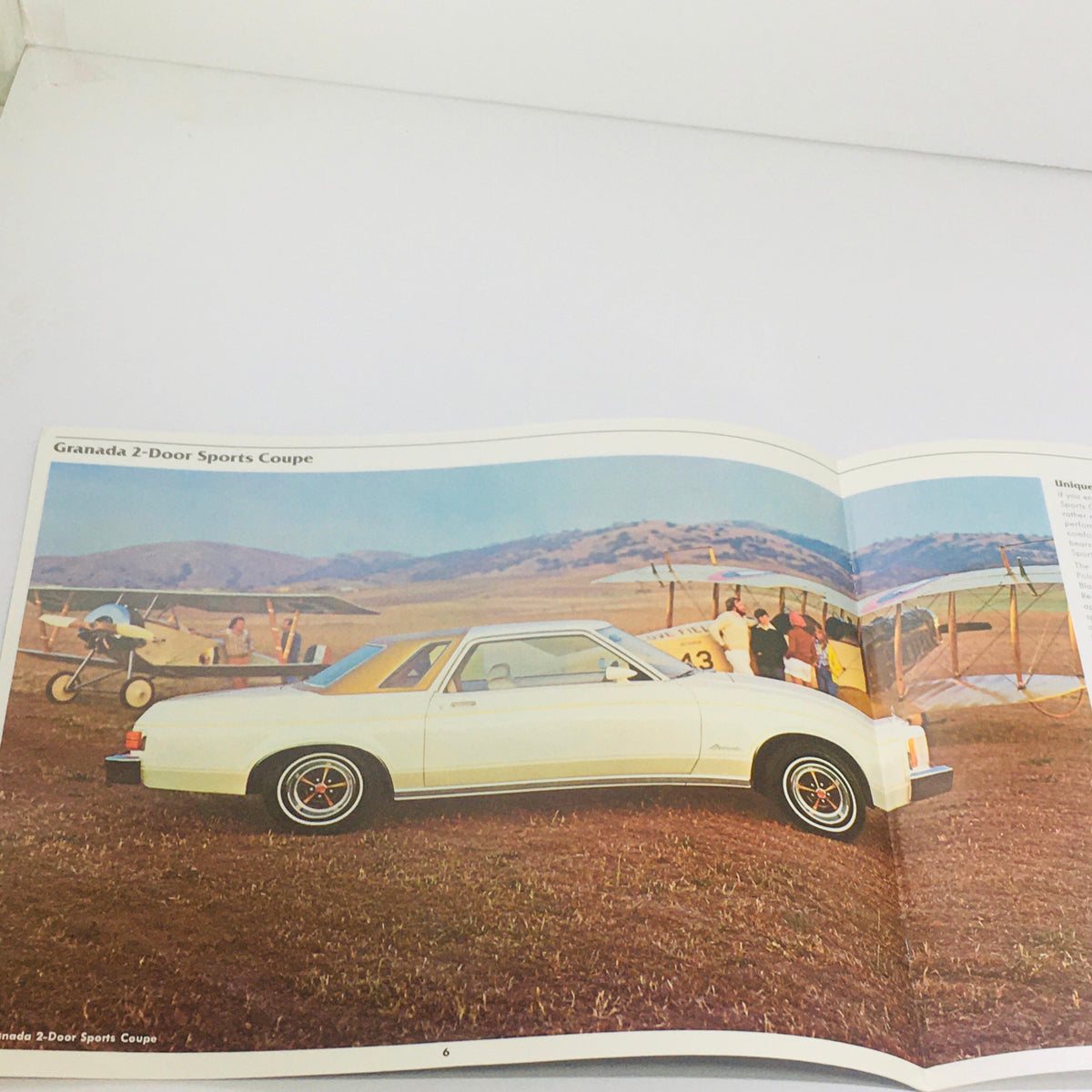 Vintage 1977 Ford Granada 12-page Original Car Sales Brochure Catalog featuring a 2-Door Sports Coupe in a scenic outdoor setting.