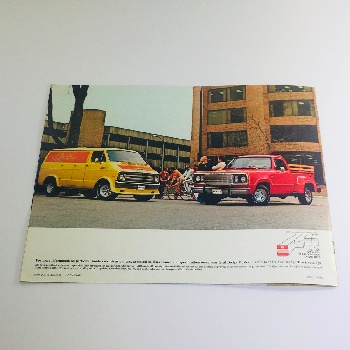 1978 Adult Toys from Dodge brochure showcasing a yellow Street Van and red Macho Power Wagon parked on a city street, highlighting vintage automotive design.