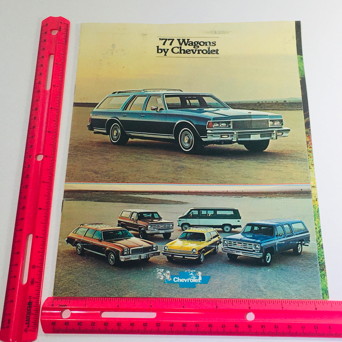 Vintage 1977 Caprice Classic Wagons by Chevrolet brochure showcasing various Chevrolet wagon models in a scenic outdoor setting. This collectible piece features the Caprice Classic prominently in the foreground, highlighting its design and specifications.