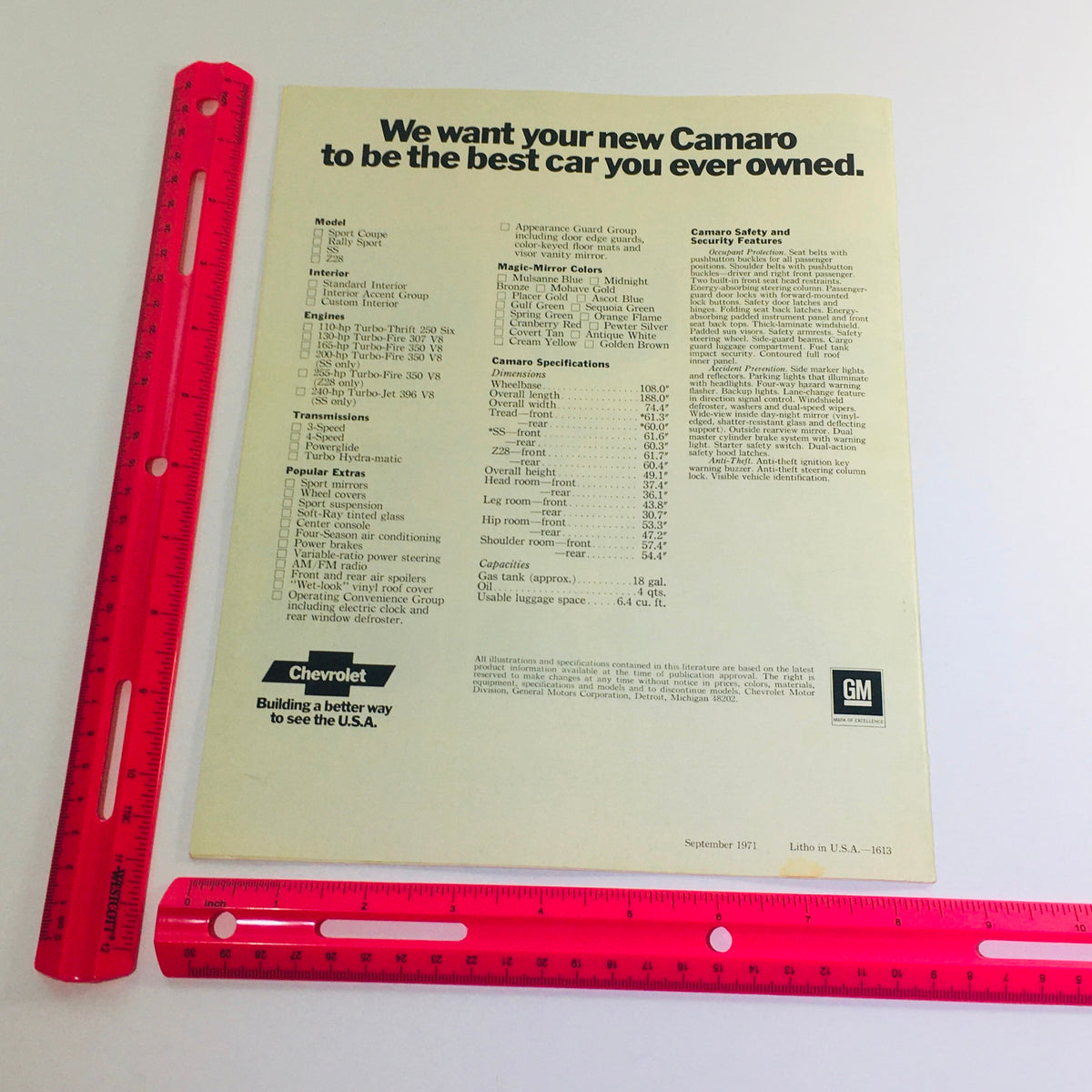 Close-up of the back section of the 1972 Camaro brochure, showing detailed specifications including dimensions, capacities, and popular extras.