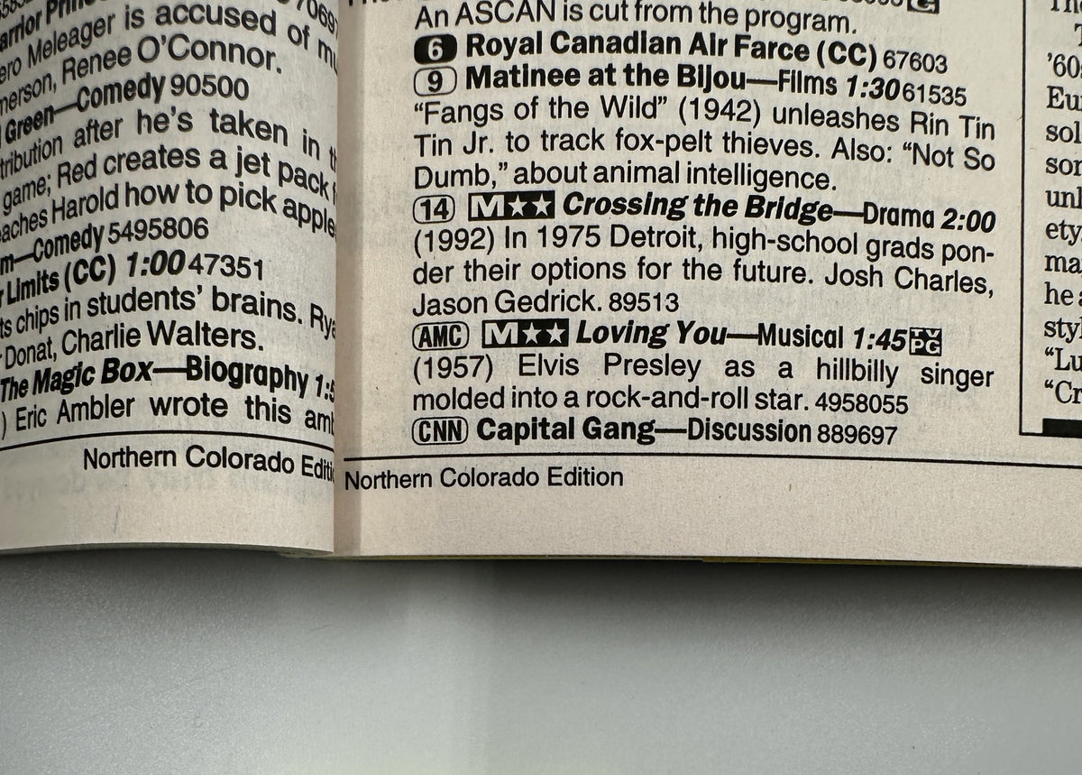 Detail page from TV Guide Magazine August 16, 1997, listing TV programs with a feature on Elvis Presley including the film 'Loving You' and its musical details.