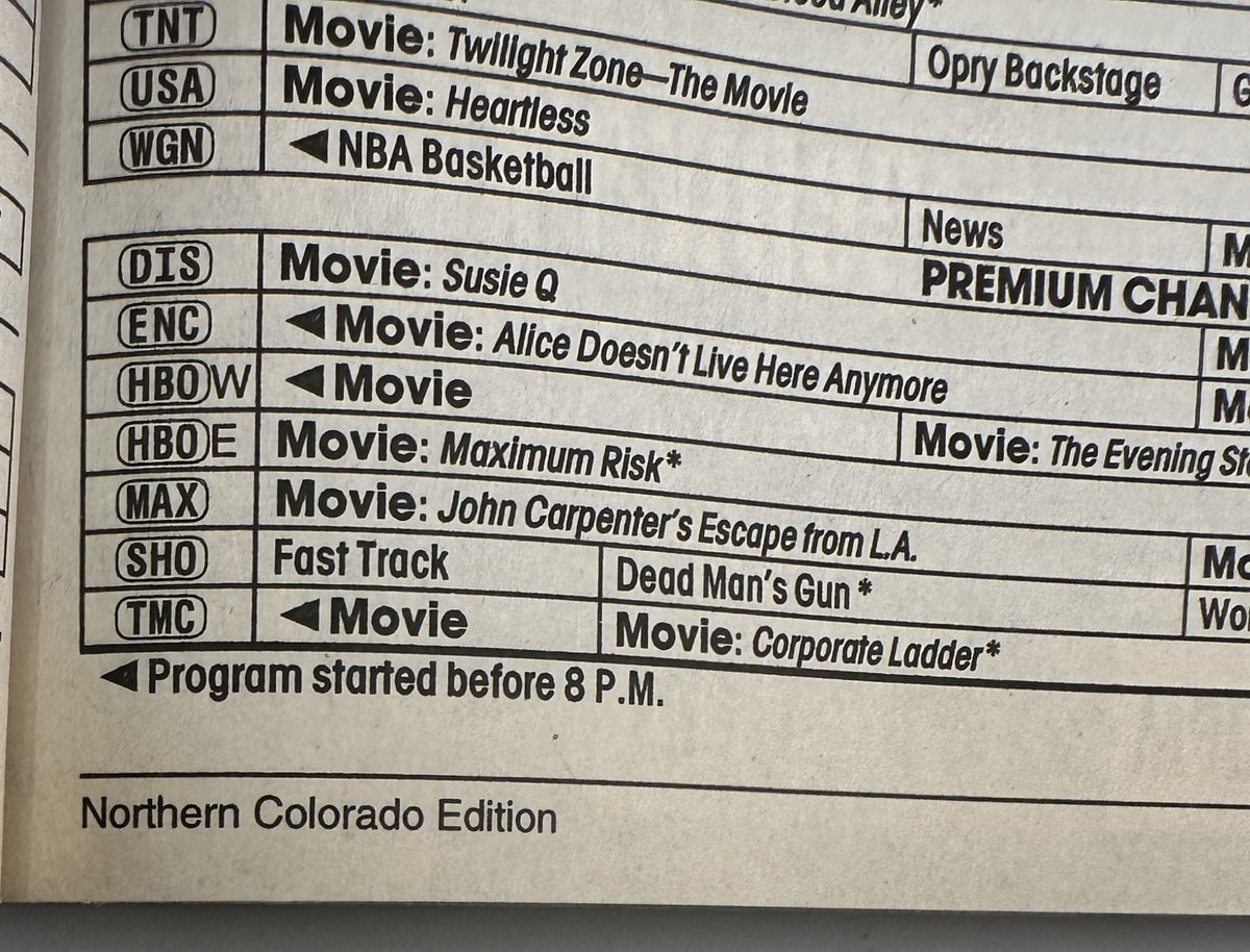 TV schedule excerpt from TV Guide Magazine November 8, 1997 including listings for movies like 'Maximum Risk' and 'John Carpenter's Escape from L.A.' with programming details.