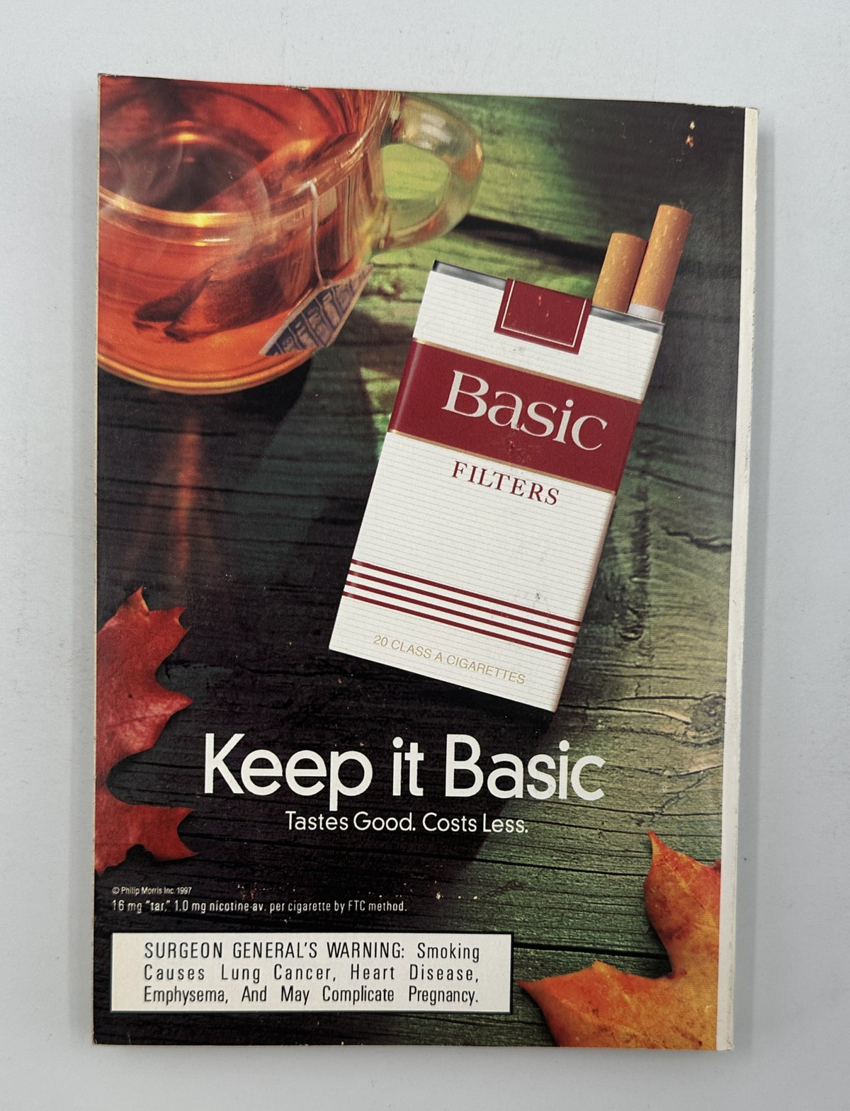 Advertisment for Basic cigarettes on the back cover of TV Guide Magazine November 8, 1997, featuring the tagline 'Keep it Basic. Tastes Good. Costs Less.'