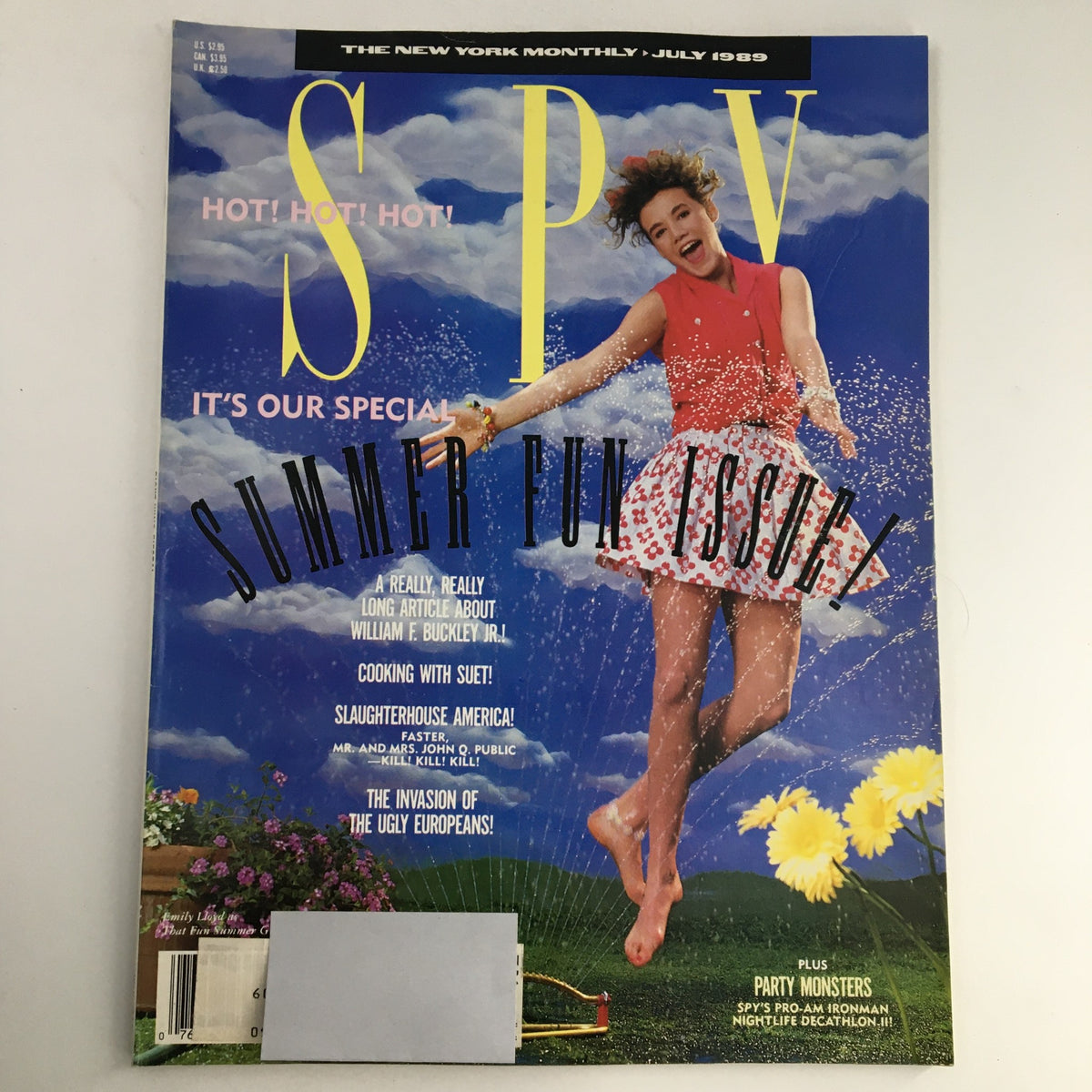 Cover of Spy Magazine July 1989 featuring an energetic woman in a red dress splashing in water, showcasing a vibrant summer fun theme, with a focus on prominent figures like William F. Buckley Jr.