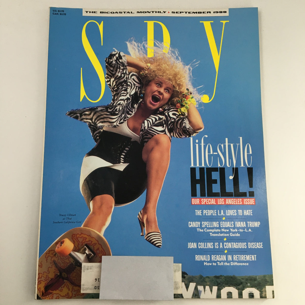 Spy Magazine September 1988 cover featuring Tracey Ullman in an energetic pose on a skateboard, along with headlines about celebrities and society, ideal for vintage magazine collectors.
