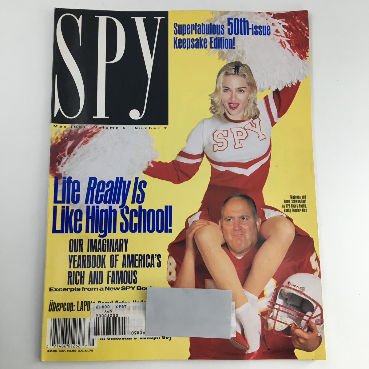Cover of Spy Magazine May 1991 Vol 5 #7 featuring a cheerleader and a football player, highlighting themes of celebrity culture and humor.