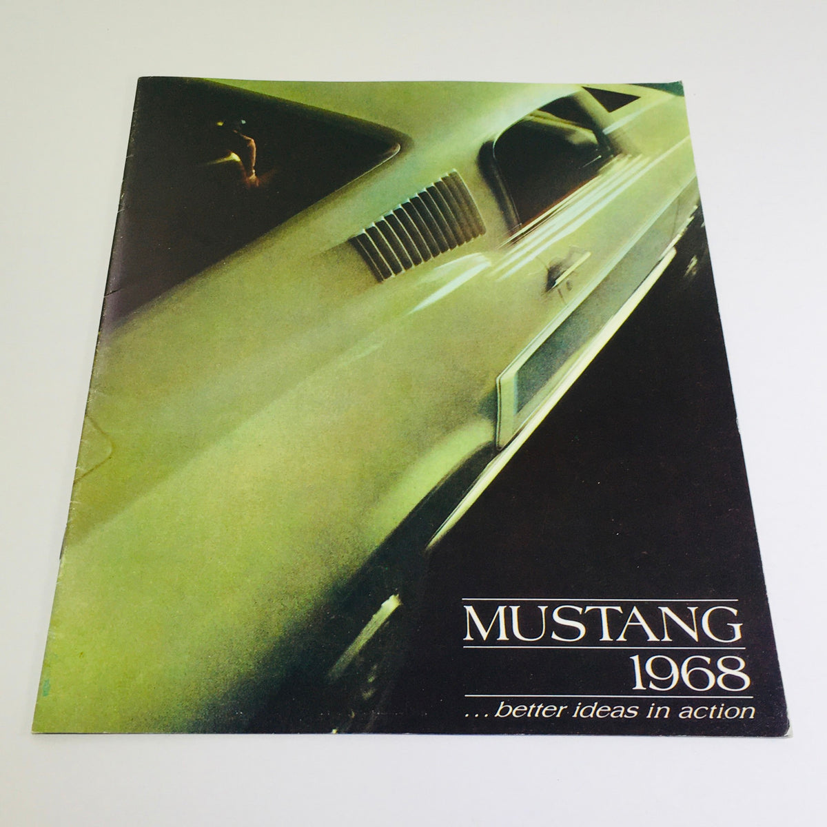 Cover of the 1968 Ford Mustang ORIGINAL Sales Brochure, showcasing the sleek design and emphasizing the tagline 'better ideas in action'.