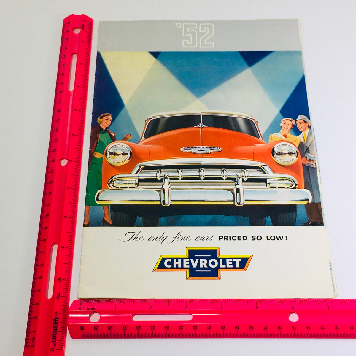 Vtg 1952 Chevrolet Bel Air fleetline full line auto car sales catalog brochure with a vibrant illustration of the car and text highlighting pricing and features.