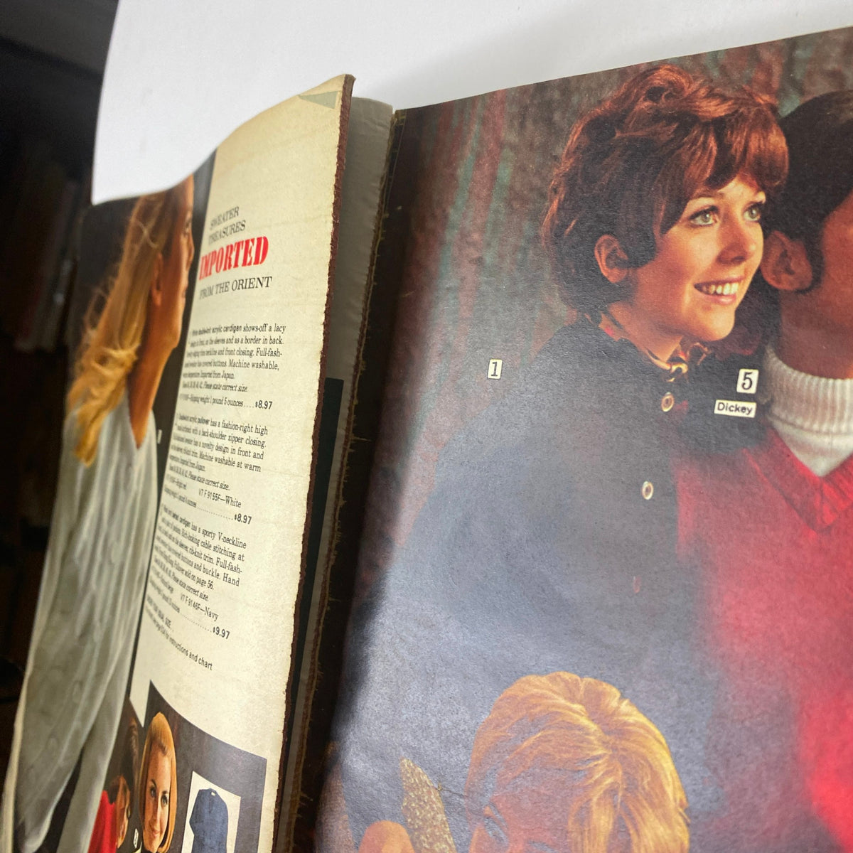 Interior page of the 1969 Sears Fall and Winter Catalog showing children and adults wearing fashionable winter outfits.