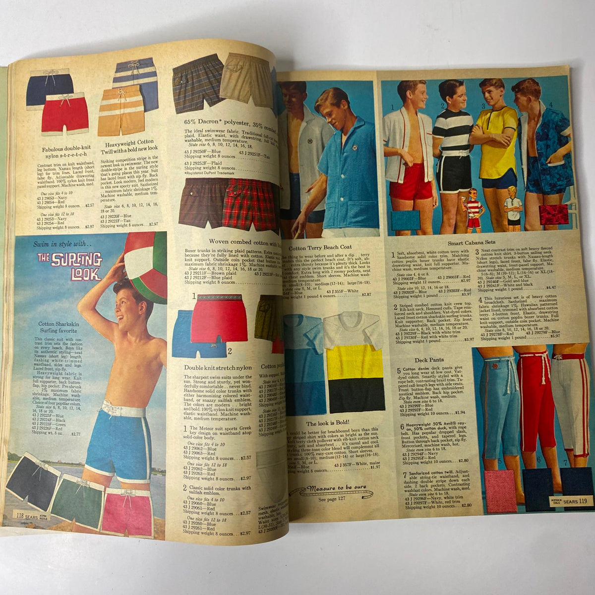1965 Sears Country Style Summer Catalog displaying men's swimwear options including colorful shorts and beach attire, reflecting the fashion of the era.