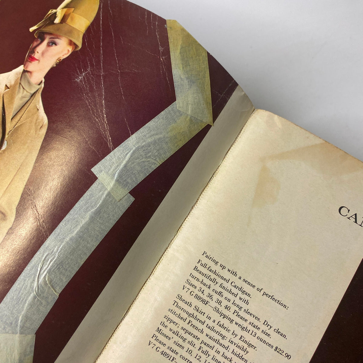 Inside view of the 1963 Sears Fall and Winter Catalog, showcasing a model in stylish winter apparel, promoting mid-century fashion.