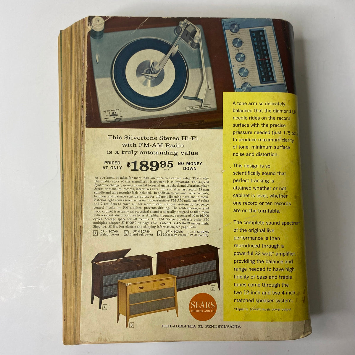 1962 Sears Fall and Winter Catalog back cover showcasing a Silvertone stereo hi-fi with FM-AM radio and product details, demonstrating vintage audio equipment.