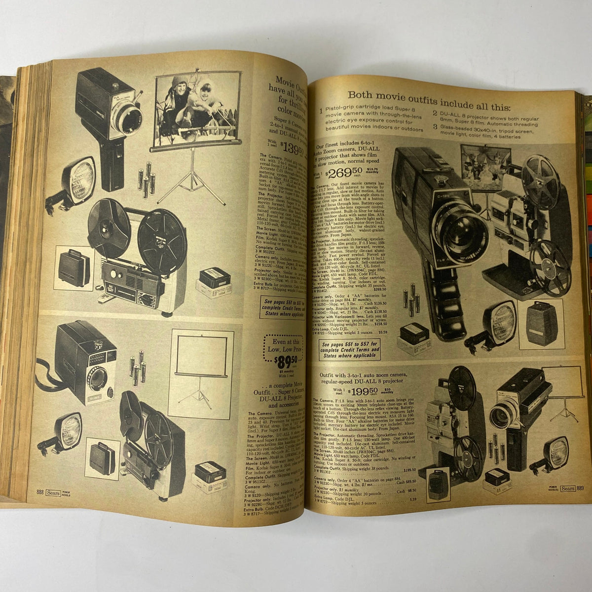1970 Sears Fall and Winter Catalog showcasing vintage movie cameras and projectors, illustrating the film equipment available during the early '70s.