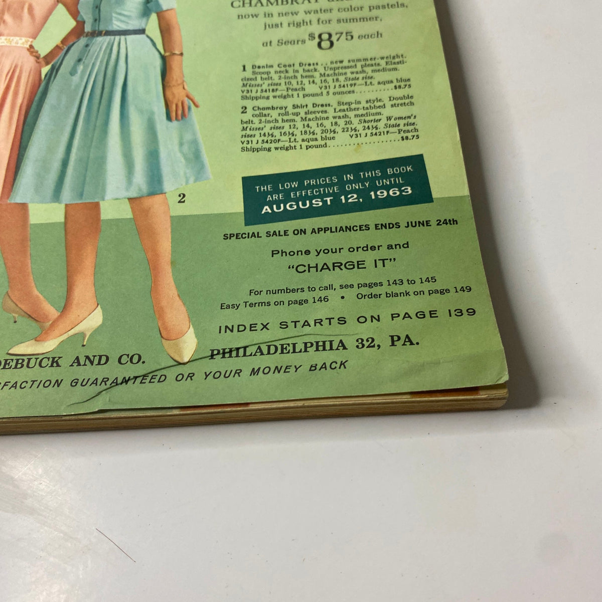 Close-up of the lower portion of the cover of the 1963 Sears Summer-Right Catalog detailing the pricing of summer dresses and special sale information.