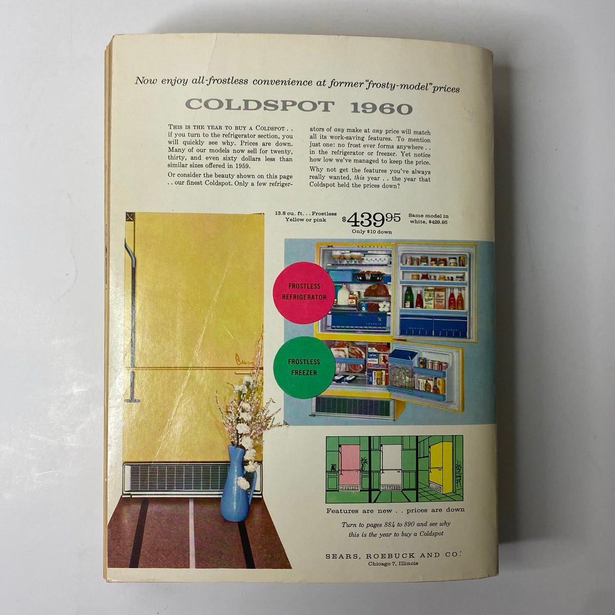 1960 Sears Roebuck and Co. Illinois Spring through Summer Catalog cover emphasizing the Coldspot frostless refrigerator and freezer with vibrant color illustrations and price details.
