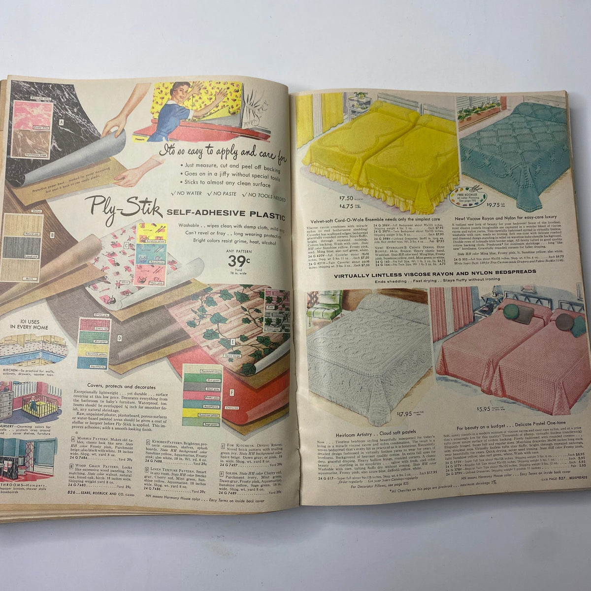 Vintage advertisement page from the 1956 Sears Roebuck and Co. Fall and Winter Catalog featuring self-adhesive plastic and bedspreads, highlighting 1950s home decor trends.