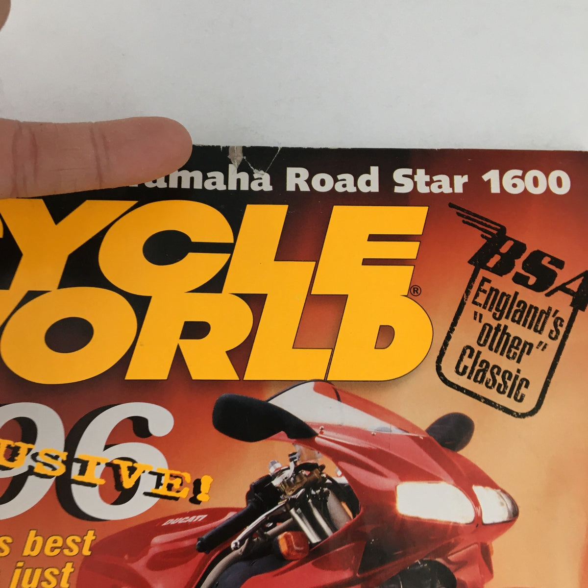 Close-up of Cycle World Magazine February 1999 cover showing the title, Yamaha Road Star 1600, and Ducati 996. The magazine discusses the best sport-twin and motorcycle reviews.