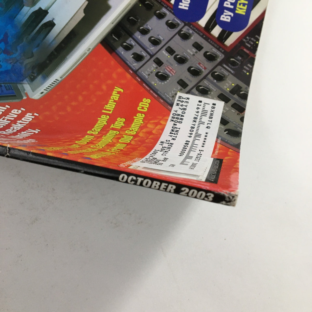 Close-up view of the October 2003 issue of Keyboard Magazine featuring Steve Winwood and Lucky Peterson, showcasing the magazine spine and minor wear typical for vintage publications.
