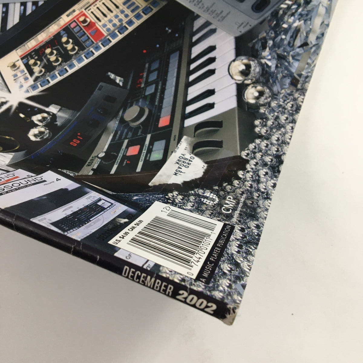 Close-up of the spine of Keyboard Magazine December 2002, detailing the issue's month and year, featuring the Holiday Gift Guide and Korg MicroKorg Review.