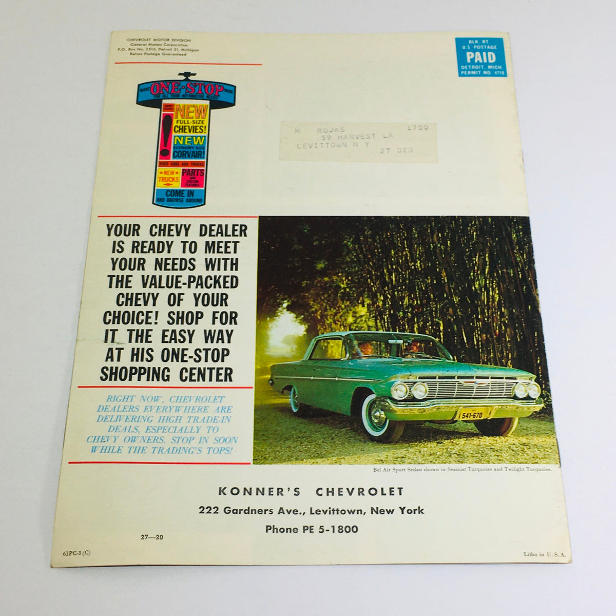 1961 Chevrolet Chevy Sedan 61PC-3 Dealership Car Auto Brochure Catalog featuring a promotional page with a green Chevy car parked in a scenic setting and dealership information.