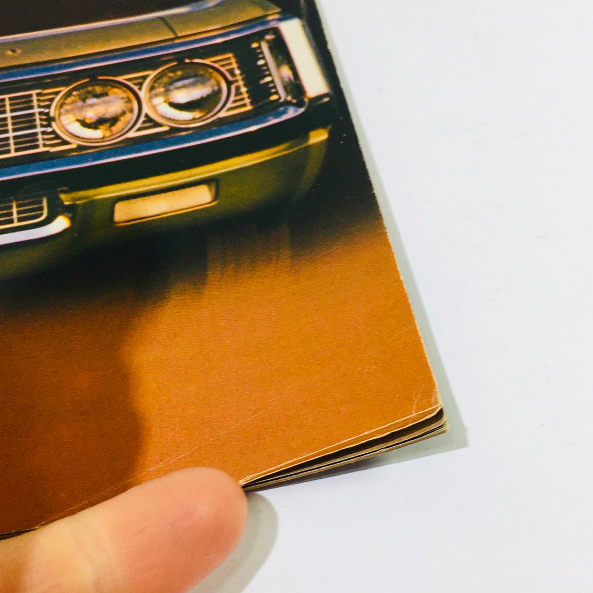 Close-up view of the front end of the 1969 Chevrolet Caprice, showcasing the detailed headlights and grille from the Dealership Car Auto Brochure Catalog.
