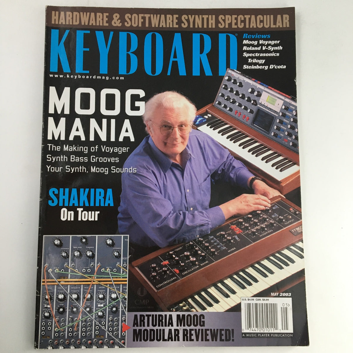 Keyboard Magazine May 2003 featuring Moog Mania with details on the making of synth bass grooves and Shakira On Tour, showcasing iconic synthesizers and music technology.