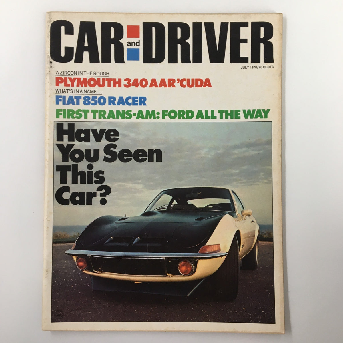 Cover of Car and Driver Magazine from July 1970 featuring the Plymouth 340 AAR 'Cuda, showcasing an iconic muscle car with a striking design against a backdrop of open road and sunset skies.