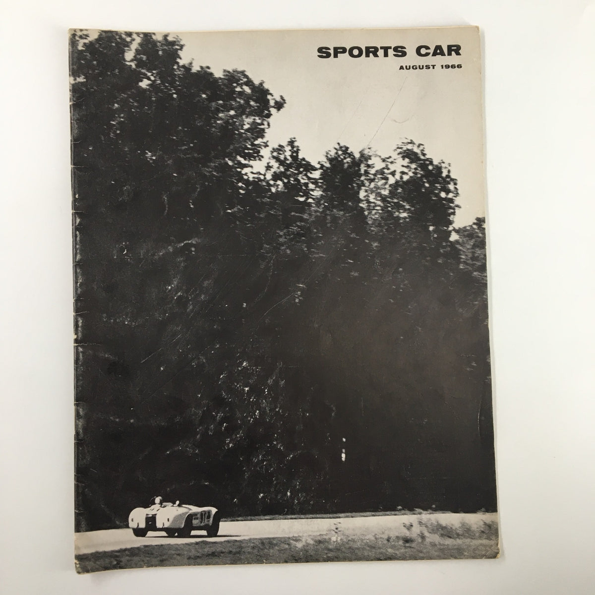Cover of VTG Sports Car Magazine August 1966 featuring a vintage sports car and wooded background, titled The Lonely Runner by Ray Boldt.