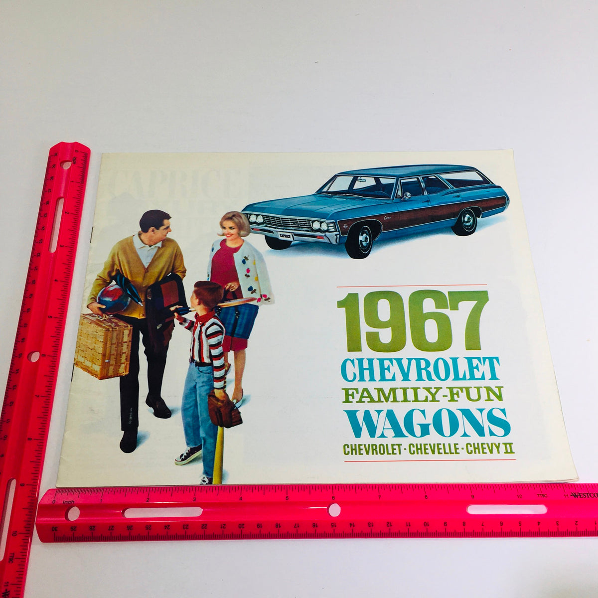 1967 Chevrolet Family-Fun Wagons Chevelle Chevy II Car Auto Brochure Catalog cover displayed with a ruler for size reference.