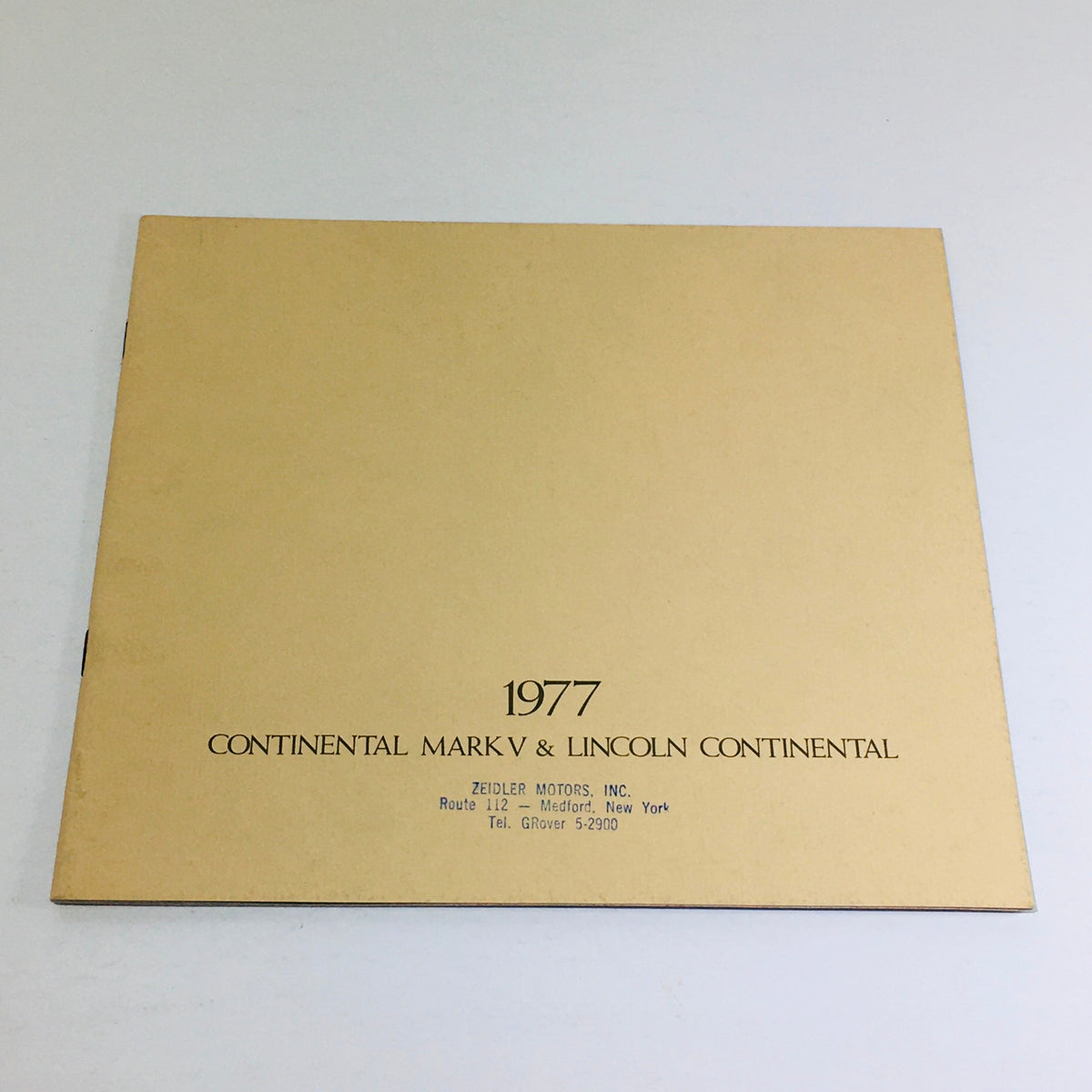 1977 Continental Mark V Lincoln Continental Dealership Car Auto Brochure Catalog cover showing the title on a beige background.
