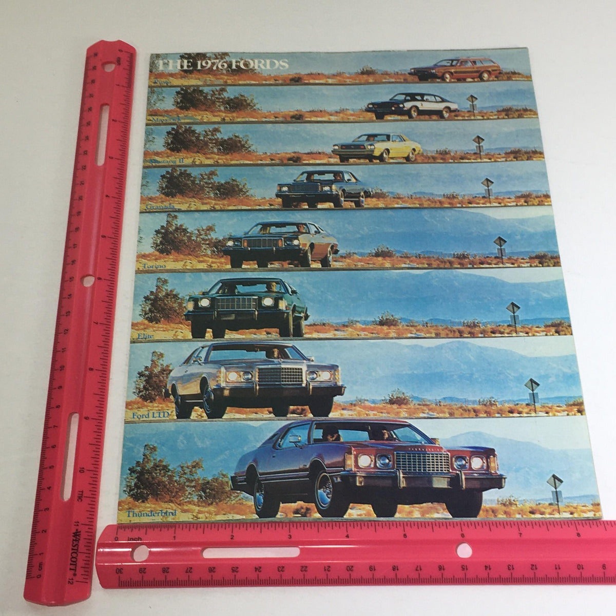 The 1976 Fords brochure displaying various models including Ford LTD and Thunderbird, highlighted with measurements and design features in excellent condition.