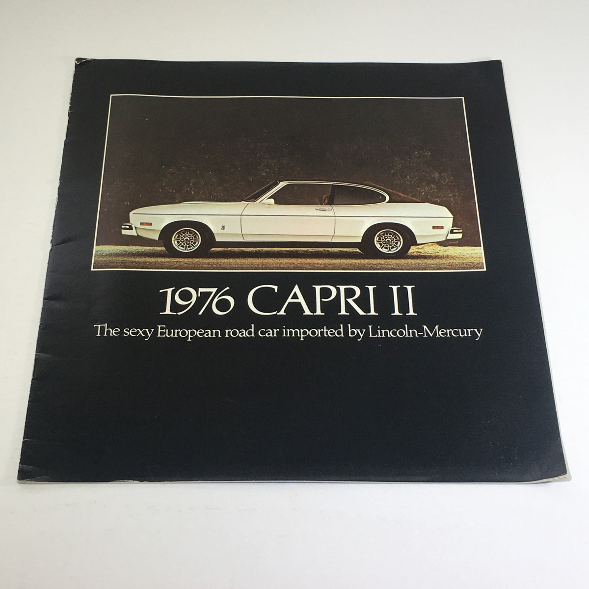 1976 Lincoln-Mercury Division Capri II Dealership Brochure showcasing the stylish European road car with detailed cover design.