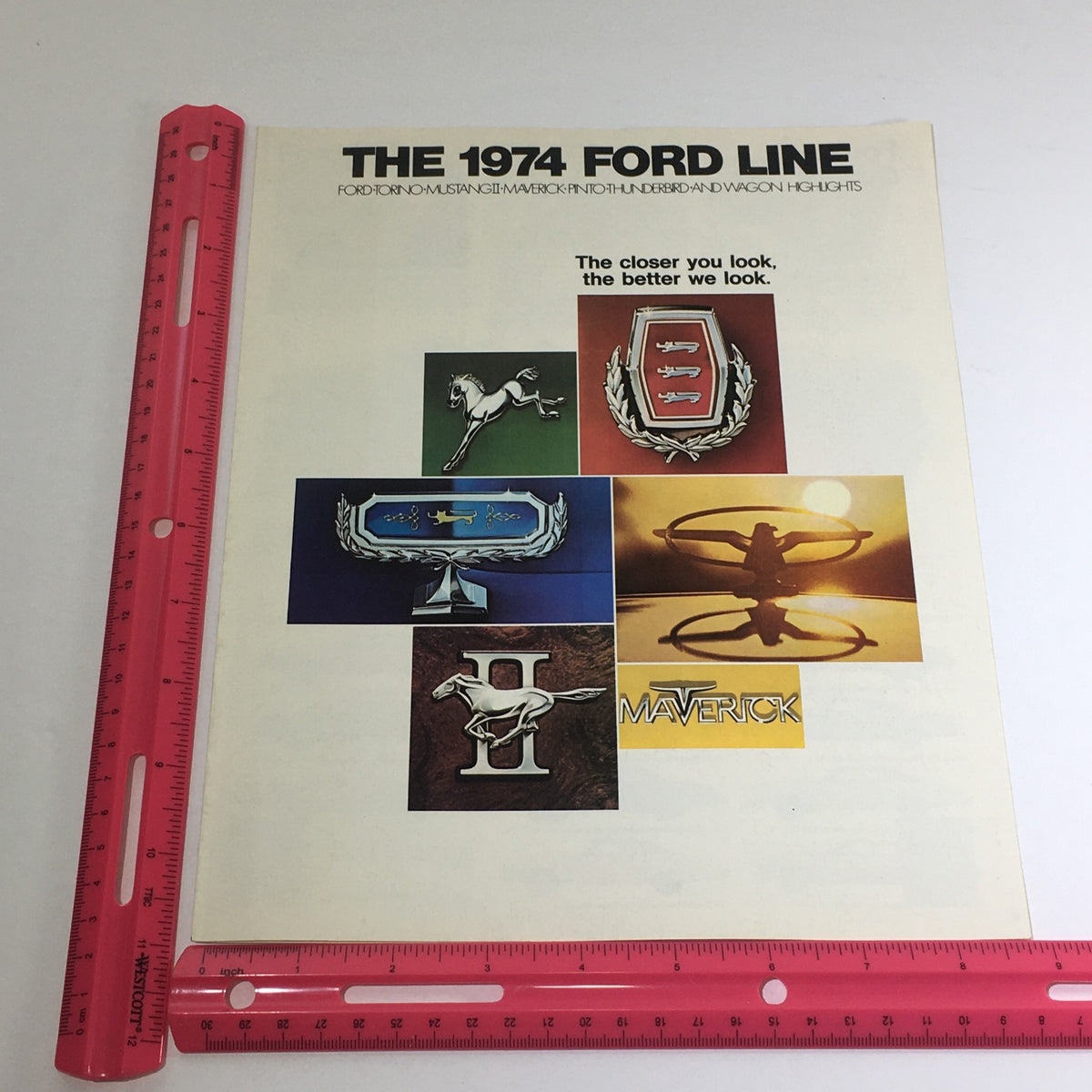 1974 Ford Torno/Mustang II/Maverick Dealership Auto Brochure showcasing various Ford badges and logos with the slogan 'The closer you look, the better we look'.