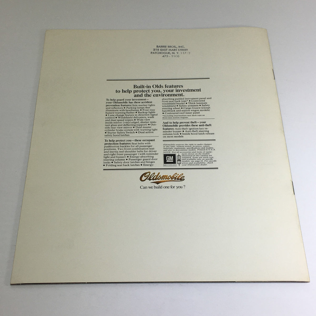 Back cover of the 1976 Oldsmobile brochure highlighting safety features and the Oldsmobile logo.