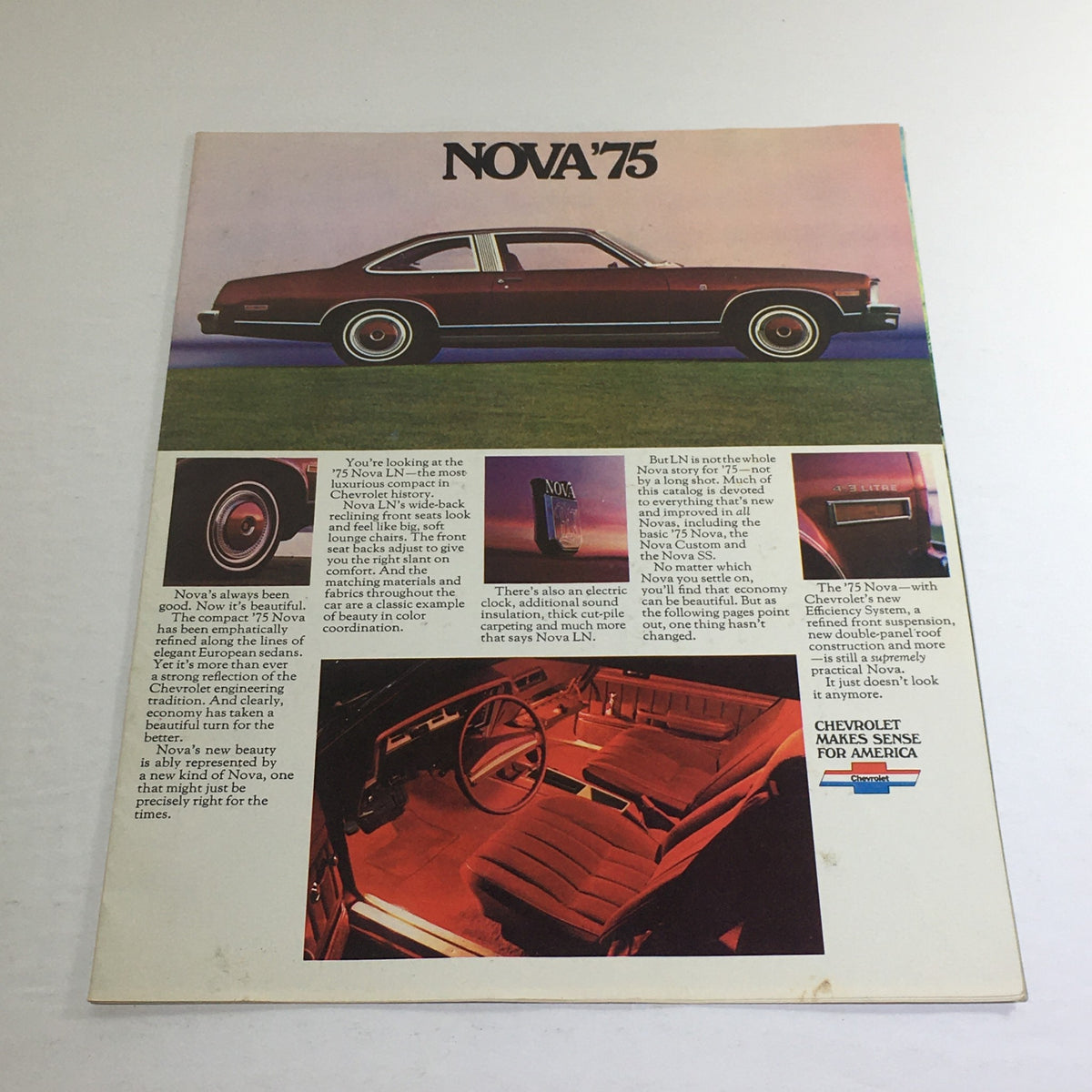 1975 Nova LN by Chevrolet Work Sheet Dealership Car Auto Brochure Catalog showcasing the exterior design of the Nova with an artistic background and interior shots on the page.