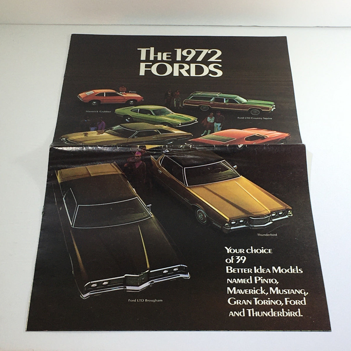 Inside view of the 1972 Fords LTD Brougham & ft. 39 Models Dealership Car Auto Brochure Catalog showcasing various Ford models including Ford LTD Brougham and Thunderbird with styling details.