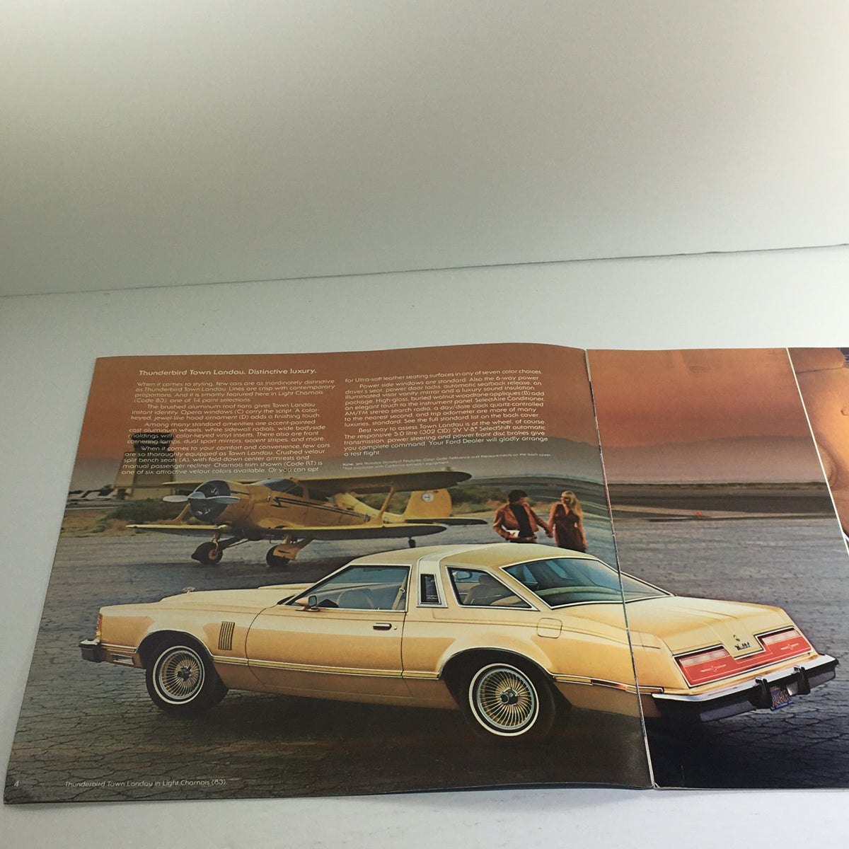 1978 Ford Thunderbird Town Landau Dealership Car Brochure showcasing the vehicle on an airstrip with a scenic background, highlighting its distinctive design and luxury features.