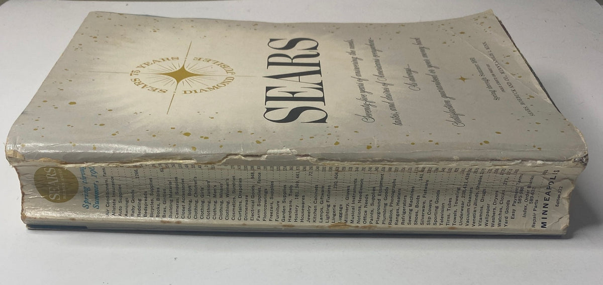 Cover of the 1961 Sears Roebuck and Co. Spring and Summer Catalog featuring a vintage design with gold accents and text highlighting the catalog's celebration of 75 years.