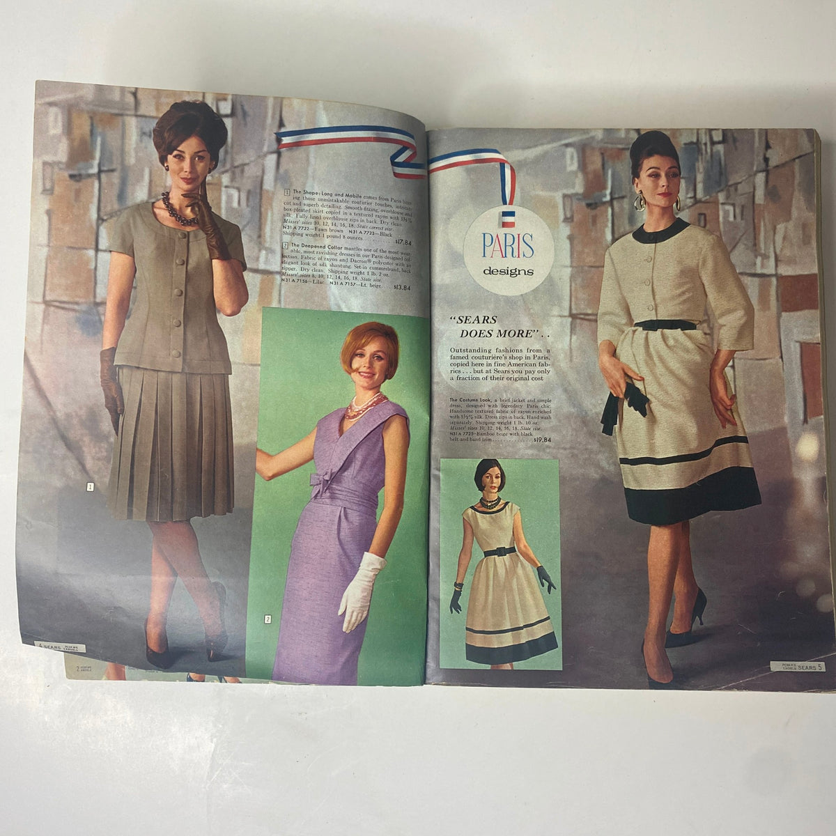 Interior page of the 1961 Sears Roebuck and Co. Spring and Summer Catalog showcasing elegant clothing designs, including a chic ensemble highlighting the phrase 'Sears Does More'.