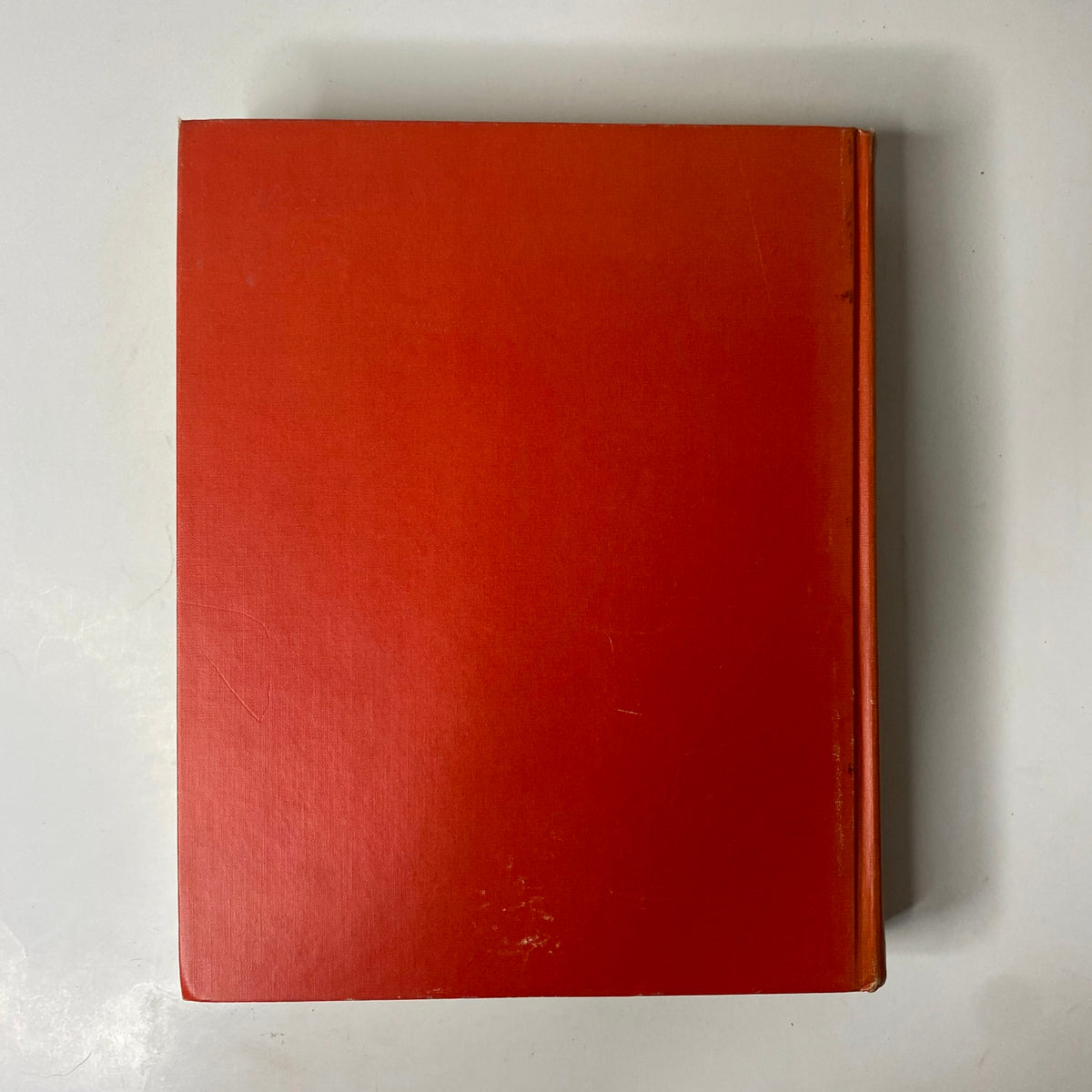 Back cover of the 1897 Sears Roebuck Consumers Guide Hardcover Catalog featuring a simple red design with minimal wear.