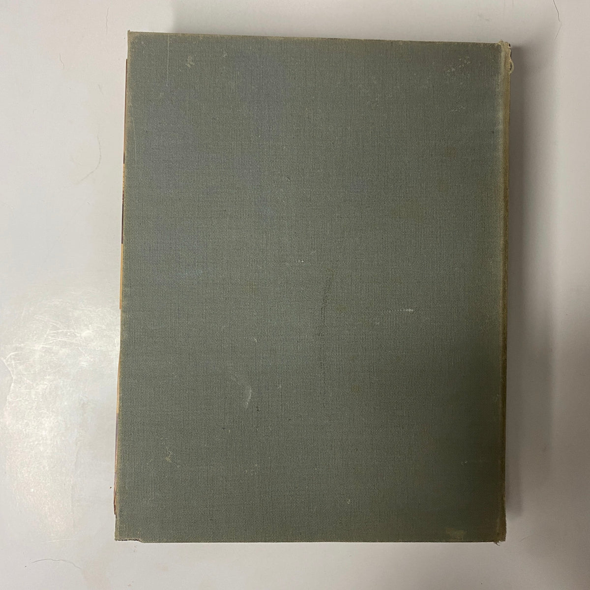 Back cover of the 1939 Sears, Roebuck and Company Spring and Summer Hardcover Catalog, displaying a faded green fabric design.