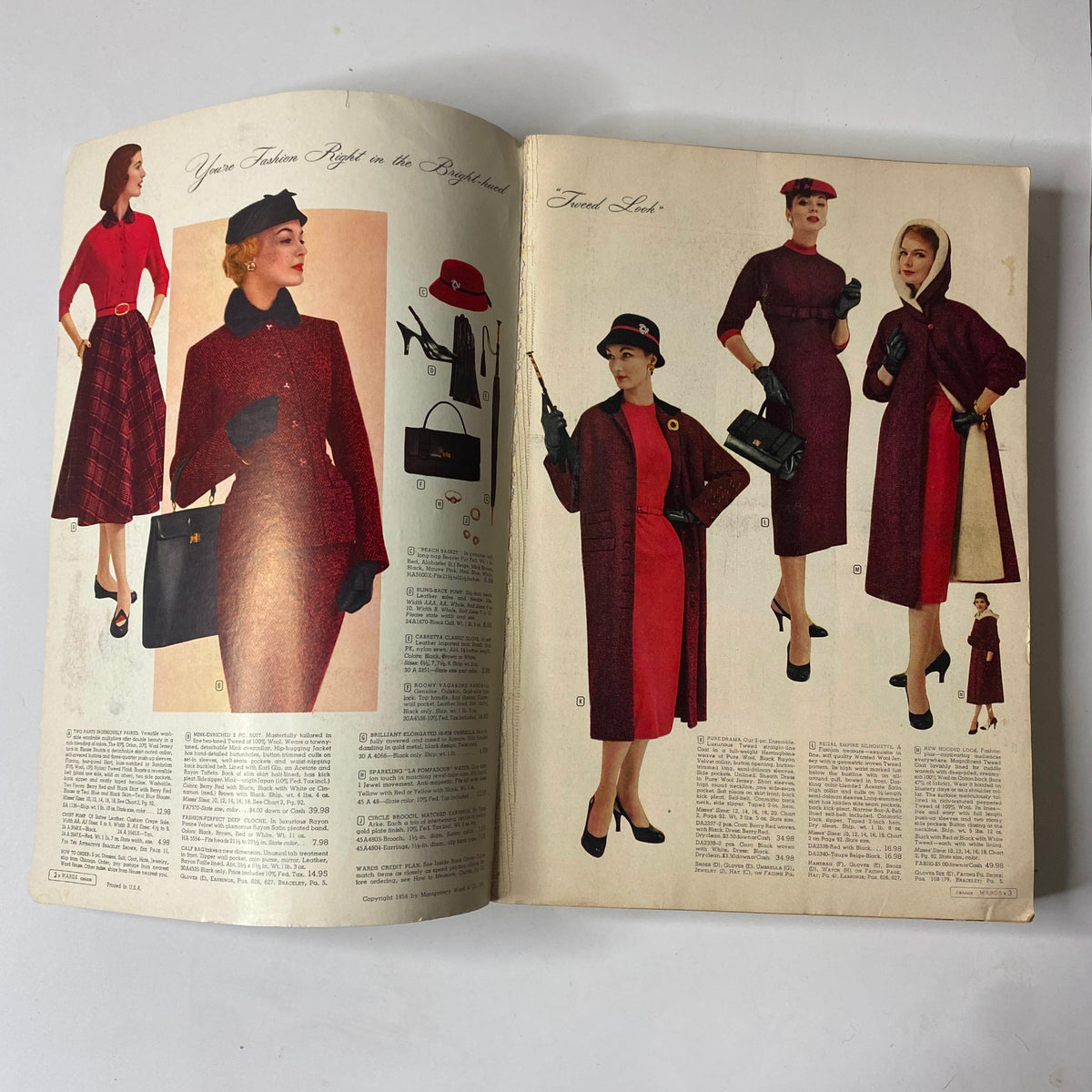 Interior page spread of the 1956 - 1957 Montgomery Ward Fall and Winter Catalog displaying fashionable outfits, including dresses and accessories for women in rich colors, representative of the era's style.