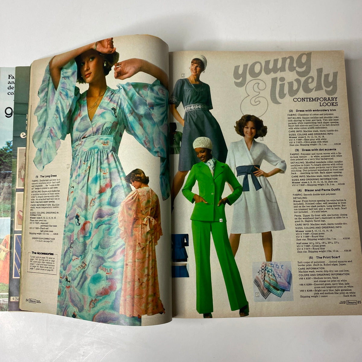 Interior page from the 1976 Sears Spring and Summer Catalog featuring contemporary women's dresses and outfits, including a floral long dress and a stylish green ensemble.