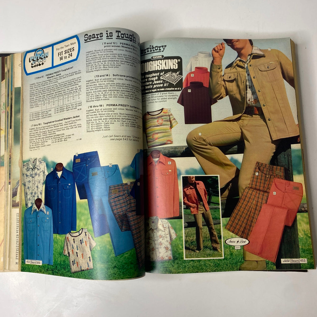 Interior page from the 1976 Sears Spring and Summer Catalog displaying rugged men's fashions, including denim jackets and stylish shirts.