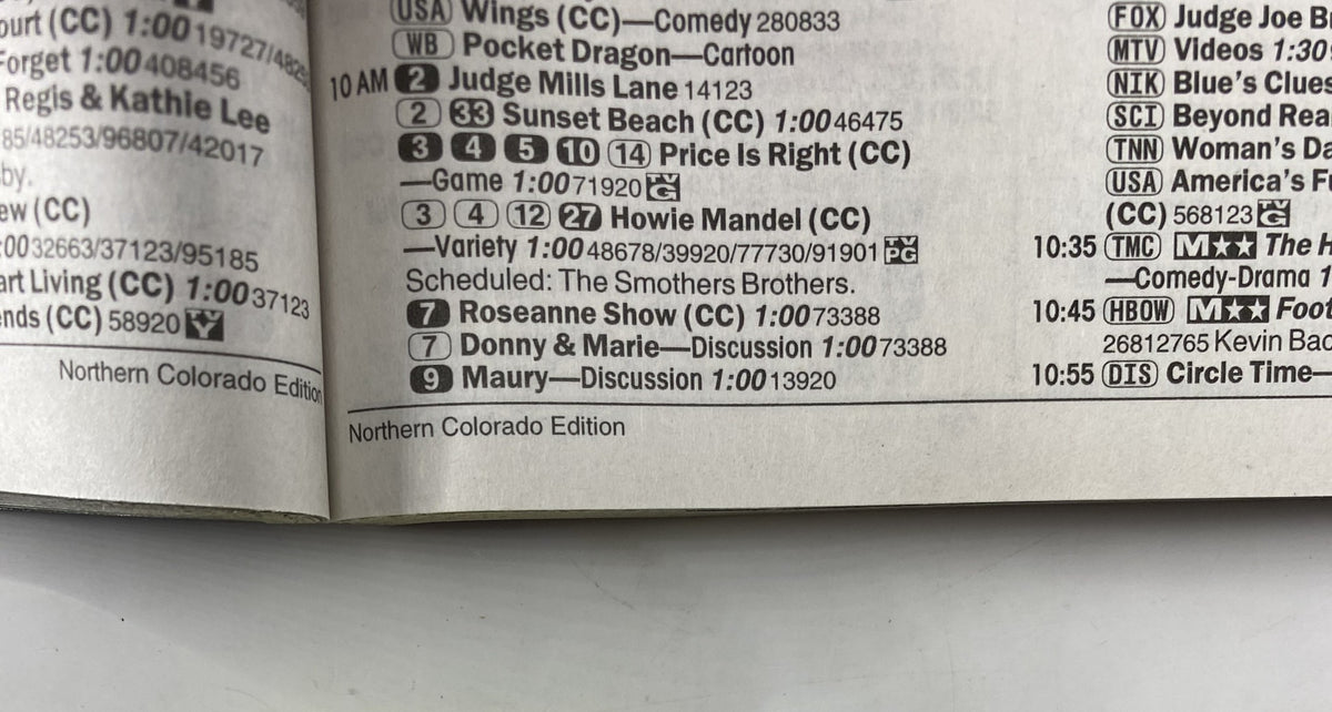 Scheduled TV listings from the May 15, 1999 issue of TV Guide Magazine, including notable shows like Roseanne and Donny & Marie.