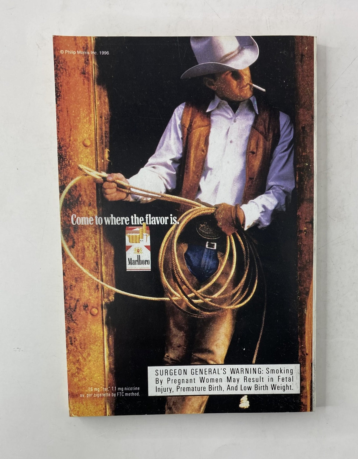 Back cover of TV Guide Magazine July 6, 1996 featuring a Marlboro advertisement, showcasing a cowboy holding a rope, promoting the brand with a cautionary surgeon general's warning.