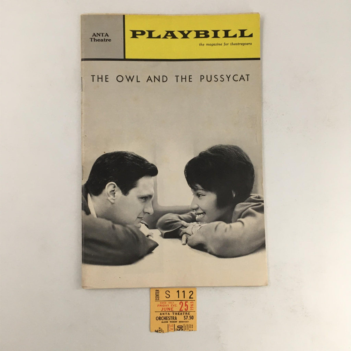1965 Playbill for The Owl And The Pussycat, featuring a black and white cover image of two actors in a dramatic pose, with a ticket stub attached at the bottom. This collectible item from the Anta Theatre showcases theatrical history.