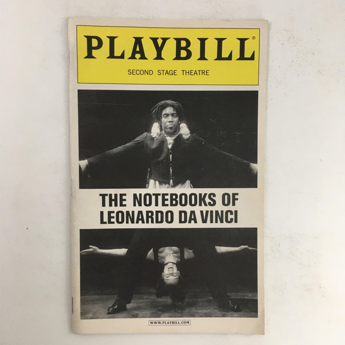 Front cover of the 2003 Playbill for 'The Notebooks of Leonardo Da Vinci' by Mary Zimmerman, showcasing dramatic imagery related to the play and Second Stage Theatre branding.