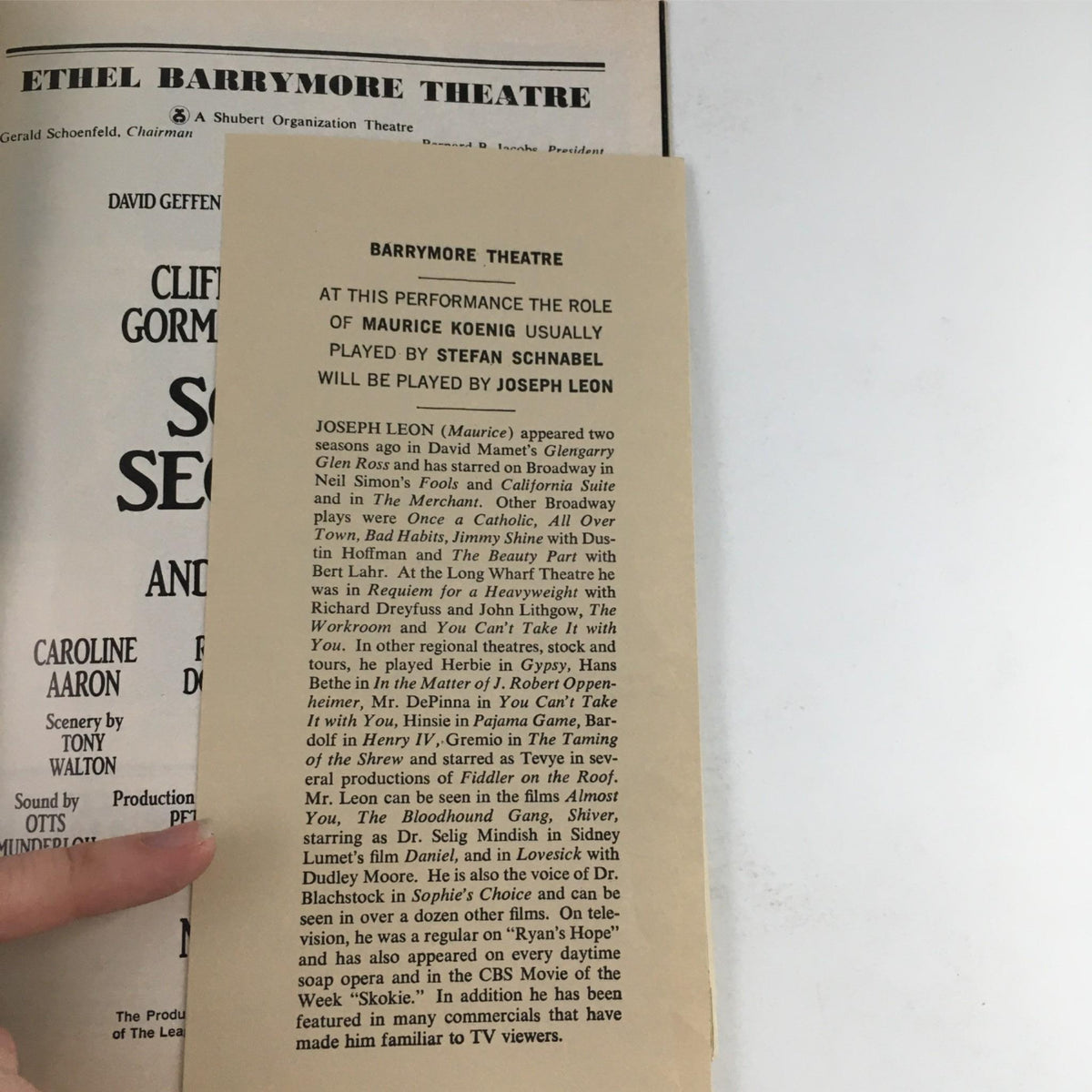 An informational insert in the 1987 Playbill for 'Social Security', announcing a cast change with details about actor Joseph Leon.